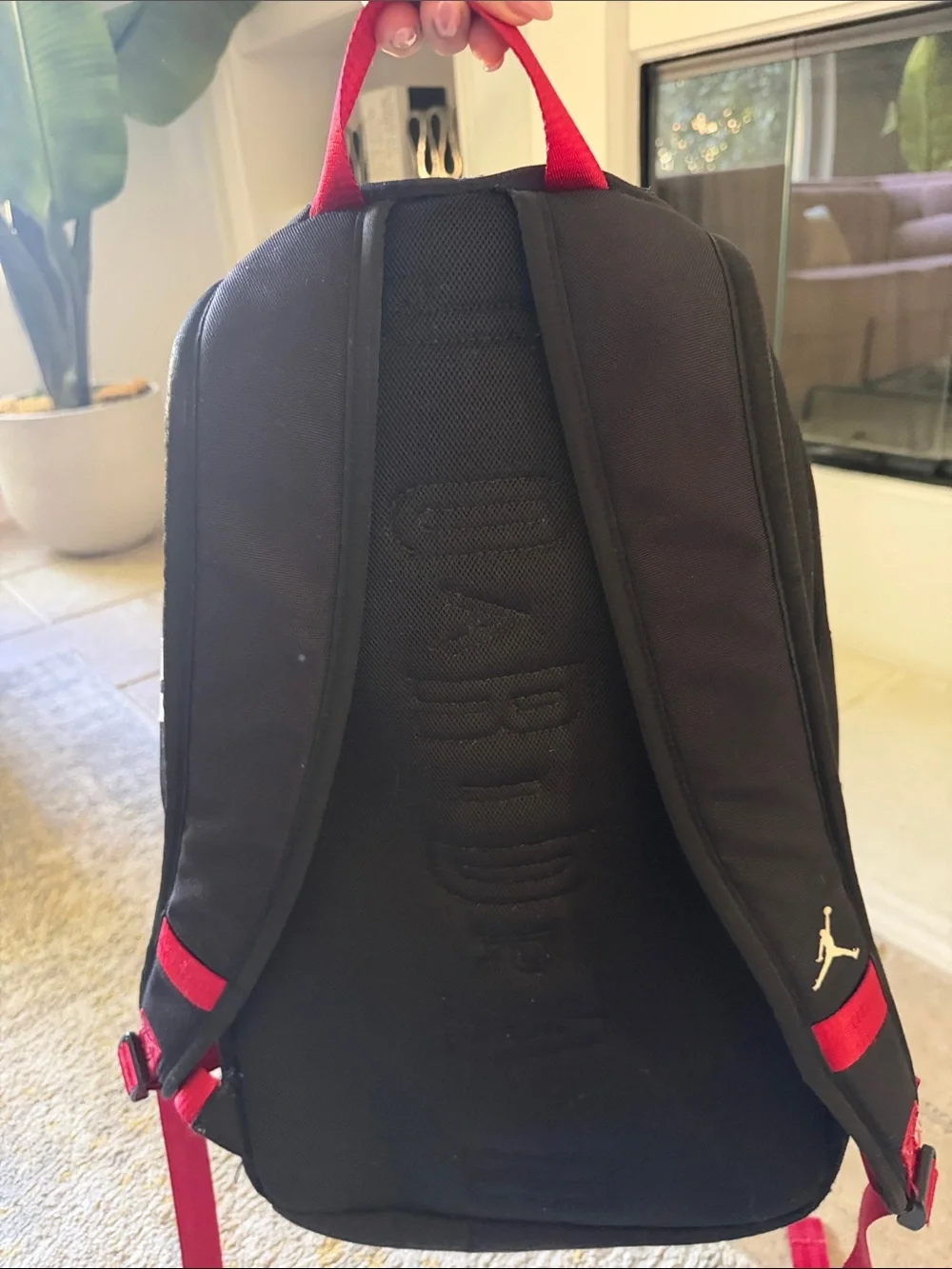 Jordan Black Backpack with Red Accents